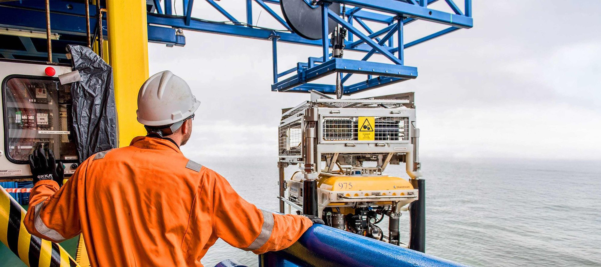 Man looking out to subsea ROV